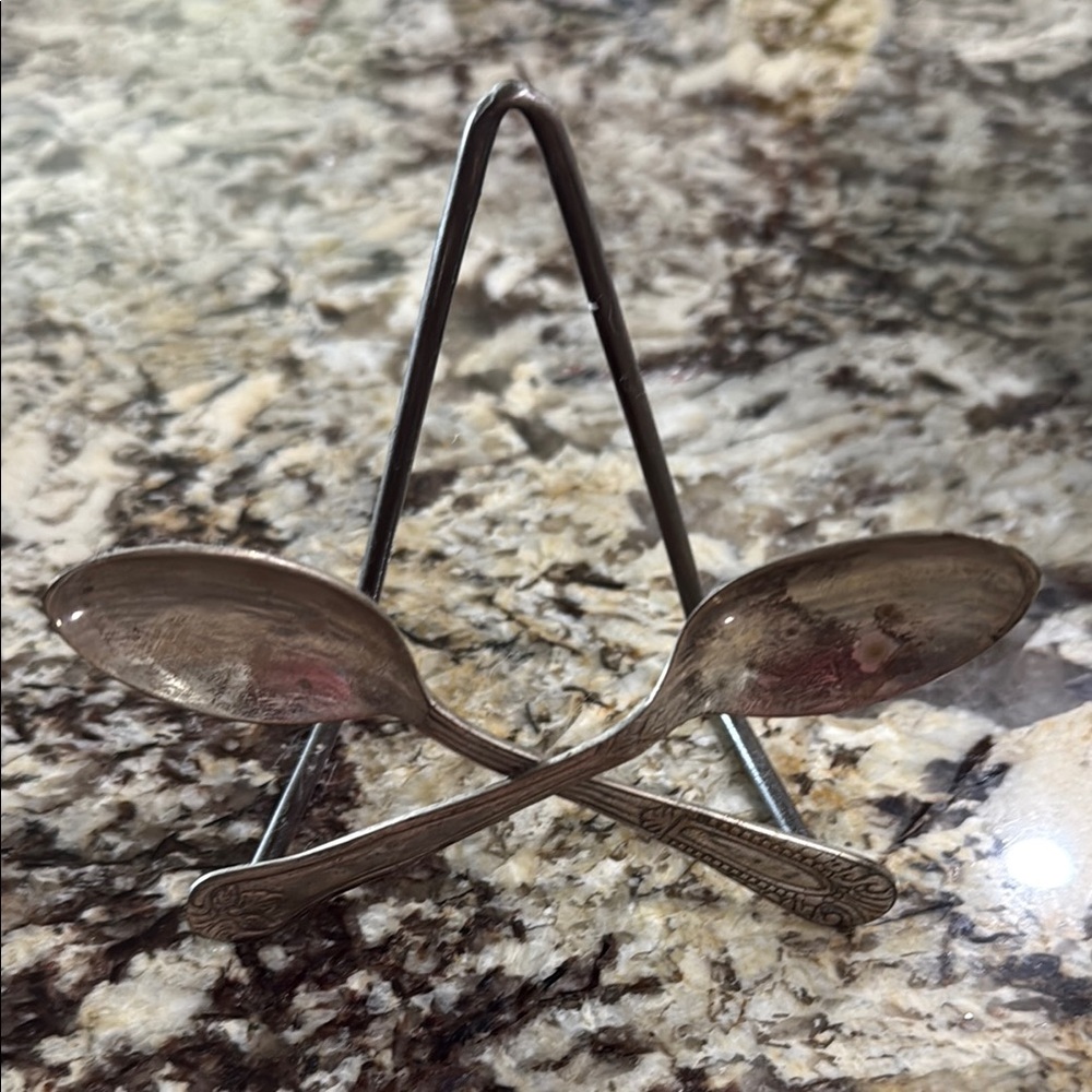 Rare Anthropologie crossed silver spoon napkin or cookbook holder